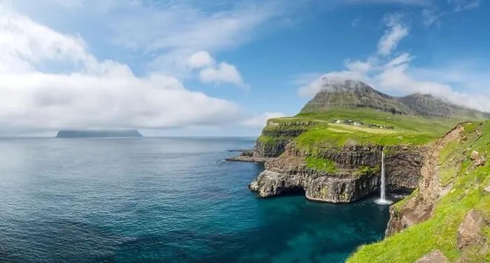 Framed Print : Incredible day view of Mulafossur waterfall in Gasadalur village, Vagar Island of the Faroe Islands, Denmark. Landscape photography