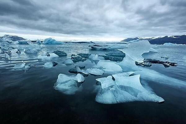 Incredible evening landscape with floating icebergs in Jokulsarlon glacier lagoon, Iceland