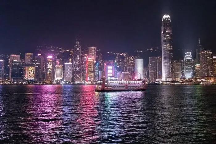Framed Print : The incredible night cityscape view of lights on the water on Victoria Harbour in Hong Kong Framed Print : The incredible night cityscape view of lights on the water on Victoria Harbour in Hong Kong