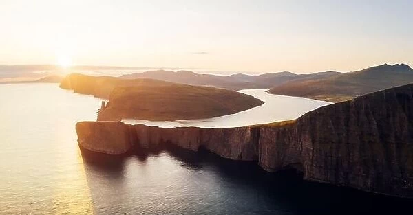 Incredible panoramical view of Sorvagsvatn lake on cliffs of Vagar island in sunset time, Faroe Islands, Denmark. Landscape photography