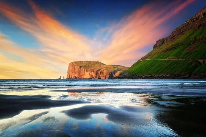 Framed Print : Incredible sunset in low tide time on Atlantic ocean coast near village Tjornuvik. Famous rock formations Risin Framed Print : Incredible sunset in low tide time on Atlantic ocean coast near village Tjornuvik. Famous rock formations Risin