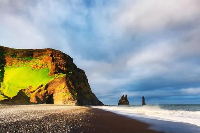 Framed Print : Incredible view on Black beach and Troll toes cliffs in cloudy weather. Reynisdrangar, Vik, Iceland. Landswcape photographyt