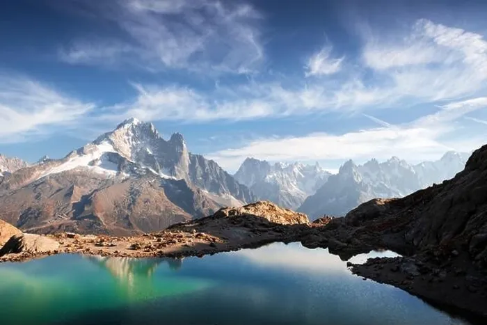 Framed Print : Incredible view of clear water and sky reflection on Lac Blanc lake in France Alps. Monte Bianco mountains range on background Framed Print : Incredible view of clear water and sky reflection on Lac Blanc lake in France Alps. Monte Bianco mountains range on background