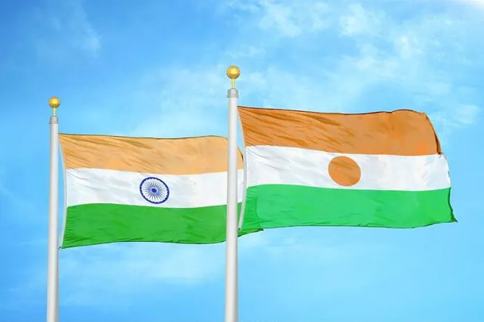 Framed Print : India and Niger two flags on flagpoles and blue cloudy sky Framed Print : India and Niger two flags on flagpoles and blue cloudy sky