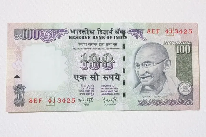 Framed Print : An Indian bank note featuring Mahatma Gandhi of 100 Rupees Framed Print : An Indian bank note featuring Mahatma Gandhi of 100 Rupees