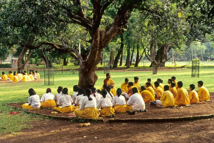 Framed Print : Indian children studying under mango tree in shanti niketan Shantiniketan garden bolpur birbhum calcutta kolkata west Framed Print : Indian children studying under mango tree in shanti niketan Shantiniketan garden bolpur birbhum calcutta kolkata west