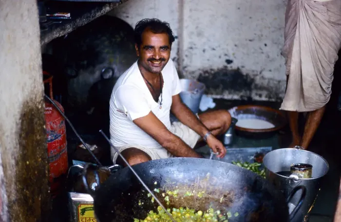 Framed Print : Indian man cooking in Jaipur market in Rajasthan, India Framed Print : Indian man cooking in Jaipur market in Rajasthan, India