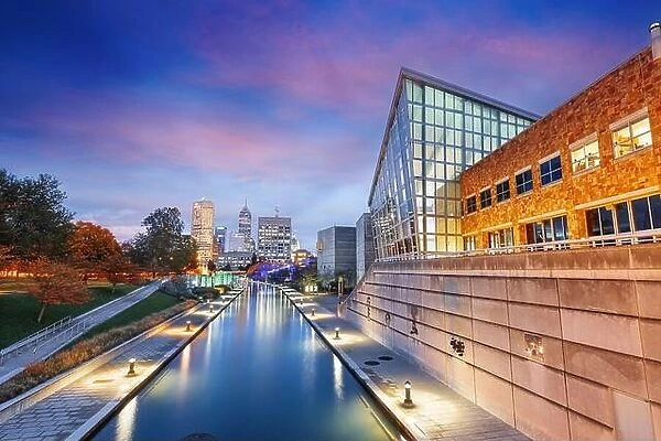 Indianapolis, Indiana, USA downtown cityscape over the river walk at twilight