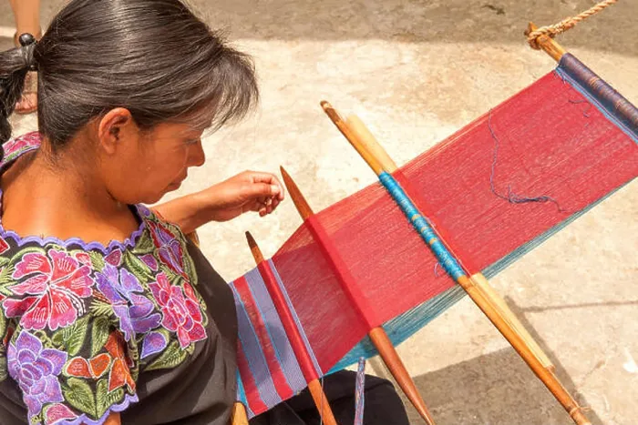 Framed Print : Indigenous Tzotzil woman weaving a traditional Huipil at the loom Framed Print : Indigenous Tzotzil woman weaving a traditional Huipil at the loom