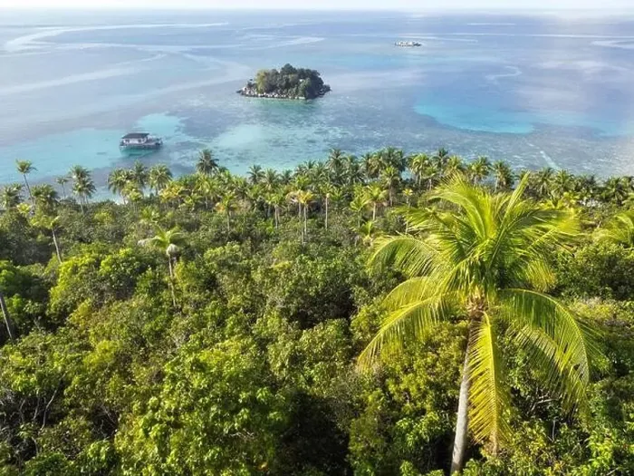 Framed Print : Indonesia Anambas Islands - Drone view Telaga Island coast line with palm trees Framed Print : Indonesia Anambas Islands - Drone view Telaga Island coast line with palm trees