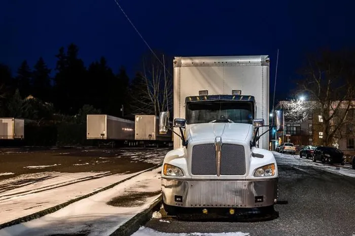 Framed Print : Industrial grade white middle duty compact bonnet rig day cab semi truck with box trailer for local deliveries standing Framed Print : Industrial grade white middle duty compact bonnet rig day cab semi truck with box trailer for local deliveries standing