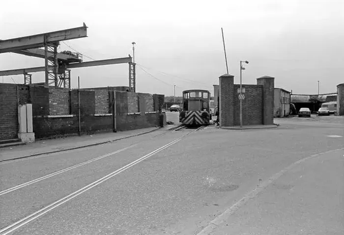 Framed Print : An industrial shunter stands at the entrance to the Ward Ferrous Metals scrapyard in Silvertown, East London