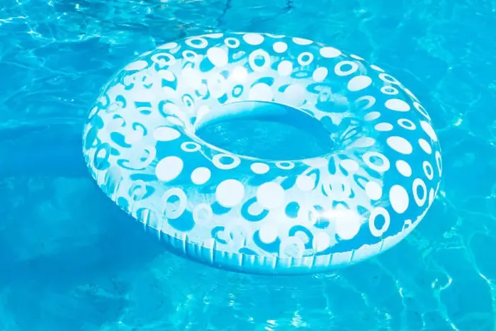 Framed Print : inflatable swimming circle in blue open-air pool in summer day Framed Print : inflatable swimming circle in blue open-air pool in summer day