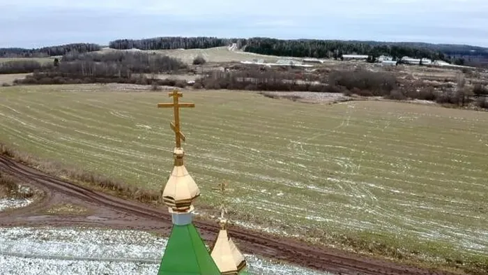 Framed Print : Initial winter. Clip.View from a drone on a landscape with snowy grass in a field where there is a temple with a golden Framed Print : Initial winter. Clip.View from a drone on a landscape with snowy grass in a field where there is a temple with a golden