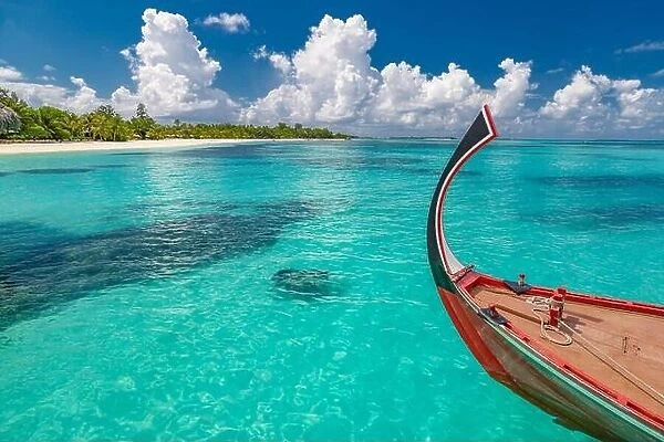 Inspirational Maldives beach design. Maldives traditional boat Dhoni and perfect blue sea with lagoon. Luxury tropical paradise beach exotic landscape