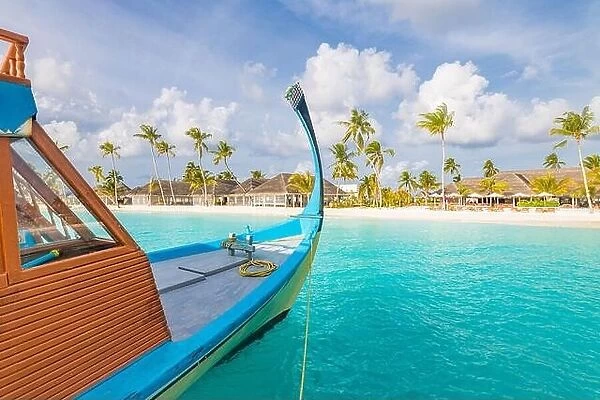 Inspirational Maldives island beach design. Maldives traditional boat Dhoni and perfect blue sea with lagoon. Luxury tropical paradise concept