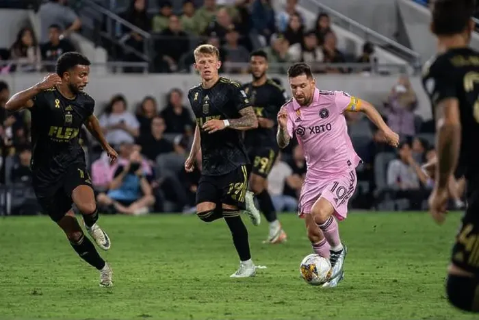 Framed Print : Inter Miami forward Lionel Messi (10) is defended by LAFC midfielder Timothy Tillman (11) during a MLS match Framed Print : Inter Miami forward Lionel Messi (10) is defended by LAFC midfielder Timothy Tillman (11) during a MLS match