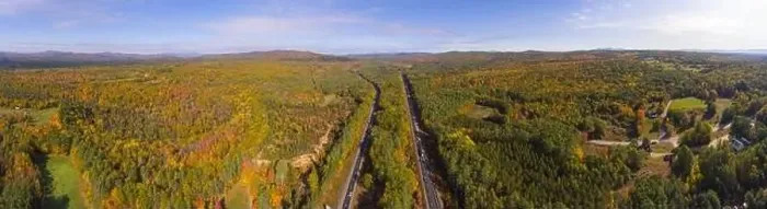 Framed Print : Interstate Highway 93 at Exit 22 with NH Route 127 in White Mountain National Forest panorama aerial view with fall Framed Print : Interstate Highway 93 at Exit 22 with NH Route 127 in White Mountain National Forest panorama aerial view with fall