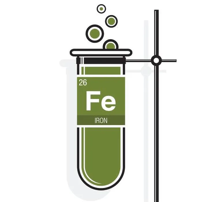 Framed Print : Iron symbol on label in a green test tube with holder Framed Print : Iron symbol on label in a green test tube with holder
