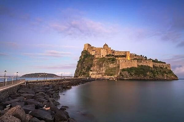 Ischia, Italy with Aragonese Castle in the Mediterranean at dawn
