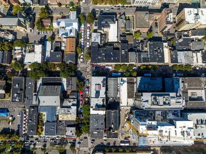 Framed Print : Ithaca, NY, USA - September 30 2023: Aerial image of the Ithaca Commons during the annual Apple Festival
