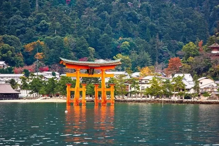 Framed Print : The Itsukushima Shrine Otorii Gate from the water at Miyajima Island, Hiroshima, Japan. (sign reads: Itsukushima Shrine) Framed Print : The Itsukushima Shrine Otorii Gate from the water at Miyajima Island, Hiroshima, Japan. (sign reads: Itsukushima Shrine)