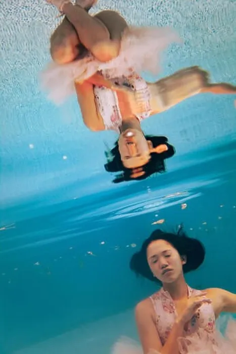 Framed Print : Japanese ballerina is dancing under water. Her reflection in water is visible Framed Print : Japanese ballerina is dancing under water. Her reflection in water is visible