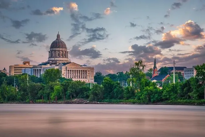 Framed Print : Jefferson City, Missouri, USA downtown view on the Missouri River with the State Capitol at dusk