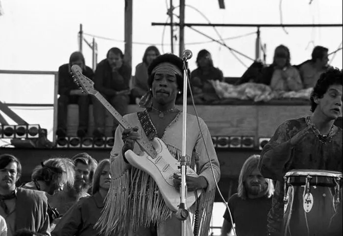 Framed Print : Jimi Hendrix performing his legendary 2 hour performance at Woodstock Music & Arts Festival held on Sam Yasgur's alfalfa field in Sullivan County in