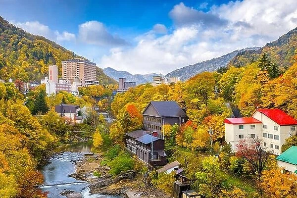 Jozankei, Hokkaido, Japan inns and river skyline during the autumn season