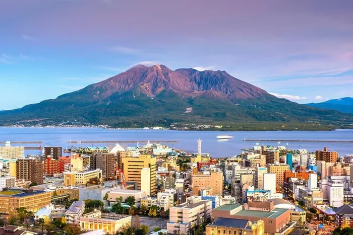 Framed Print : Kagoshima, Japan skyline with Sakurajima Volcano at dusk Framed Print : Kagoshima, Japan skyline with Sakurajima Volcano at dusk