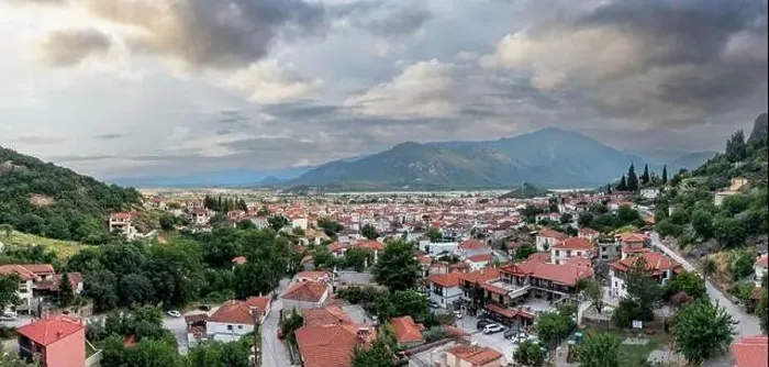 Framed Print : Kalambaka Greece. Sky with heavy clouds over Kalabaka town buildings and valley Framed Print : Kalambaka Greece. Sky with heavy clouds over Kalabaka town buildings and valley