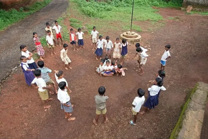 Framed Print : Katkari tribal children playing in school campus, Maharashtra, India Framed Print : Katkari tribal children playing in school campus, Maharashtra, India
