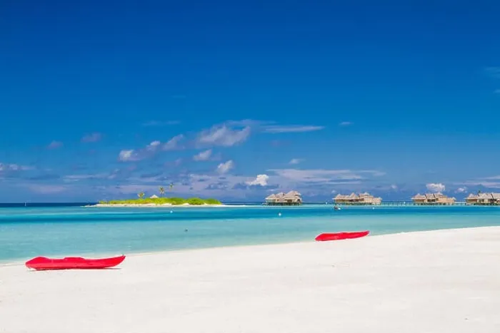 Framed Print : Kayak on sunny tropical beach with palm trees on Maldives. Luxury summer travel vacation, water sport and recreational background Framed Print : Kayak on sunny tropical beach with palm trees on Maldives. Luxury summer travel vacation, water sport and recreational background