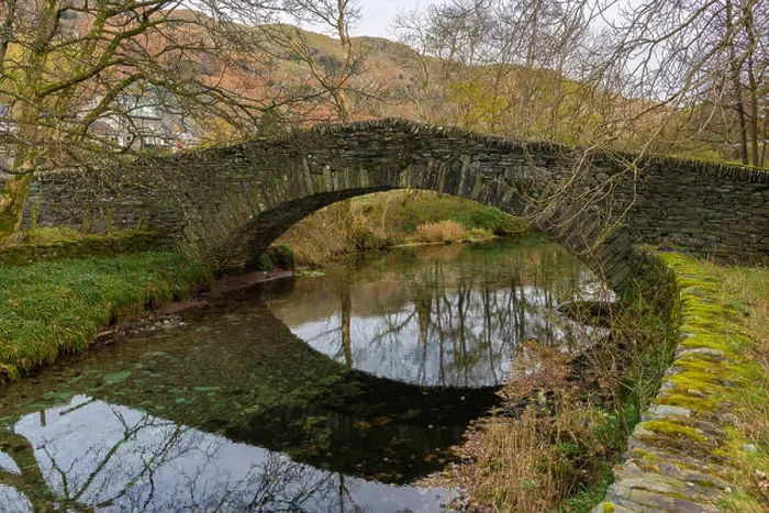Framed Print : Kidshall Bridge packhorse bridge over Great Langdale Beck at Chapel Stile in the Lake District National Park Framed Print : Kidshall Bridge packhorse bridge over Great Langdale Beck at Chapel Stile in the Lake District National Park