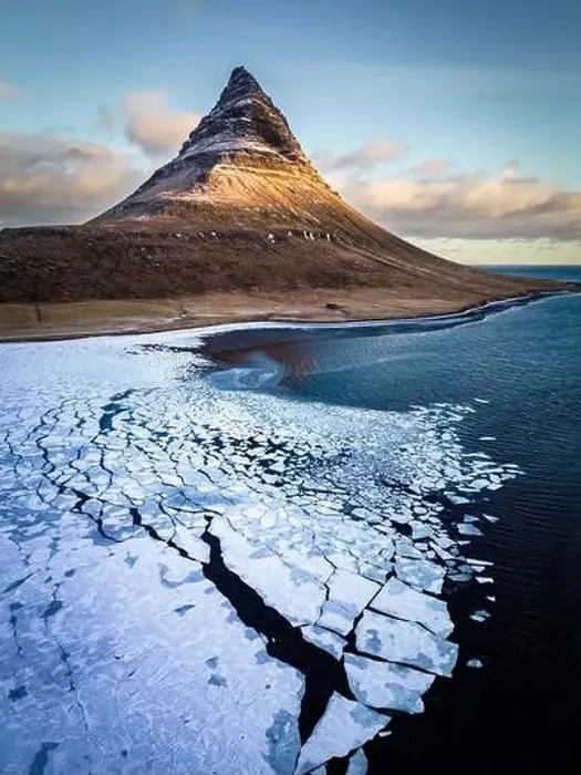Framed Print : Kirkjufell mountain in winter with frozen sea ice Framed Print : Kirkjufell mountain in winter with frozen sea ice