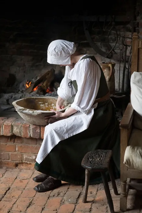 Framed Print : Kitchen servant preparing food in Kentwell Hall during a Tudor re-creation day Framed Print : Kitchen servant preparing food in Kentwell Hall during a Tudor re-creation day