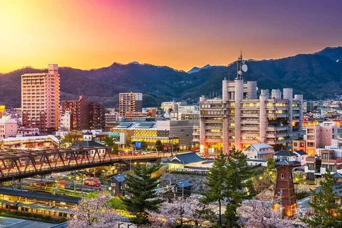 Framed Print : Kofu, Yamanashi, Japan downtown cityscape at dusk with spring foliage Framed Print : Kofu, Yamanashi, Japan downtown cityscape at dusk with spring foliage