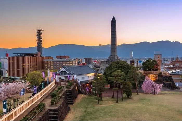 Framed Print : Kofu, Yamanashi, Japan downtown cityscape and monument tower at dusk Framed Print : Kofu, Yamanashi, Japan downtown cityscape and monument tower at dusk