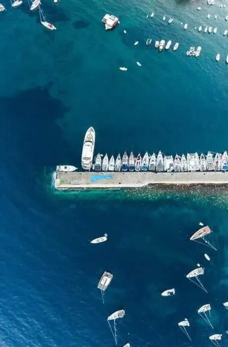 Framed Print : Komiza, Croatia - Aug 19, 2020: Aerial overhead shot of Komiza town port of Vis Island before sunrise in Croatia morning Framed Print : Komiza, Croatia - Aug 19, 2020: Aerial overhead shot of Komiza town port of Vis Island before sunrise in Croatia morning