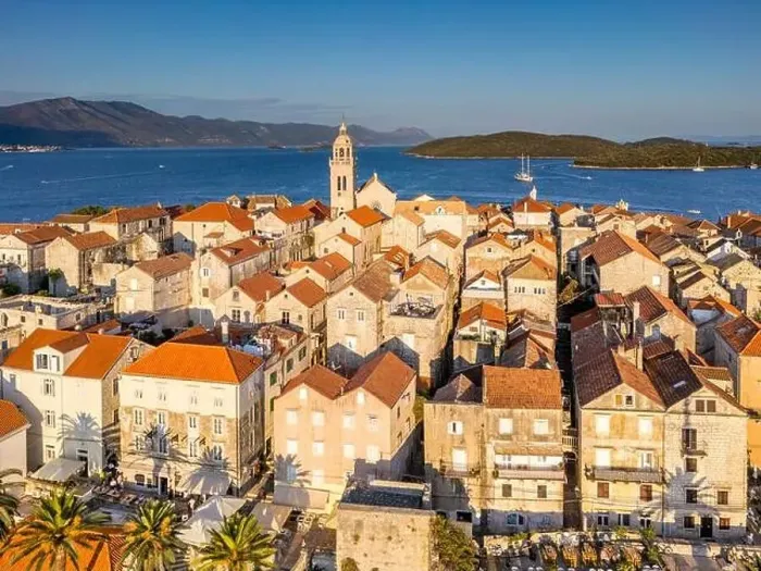 Framed Print : Korcula Island, Croatia - August 5, 2024: Aerial view of Korcula city in the island of Korcula, Croatia
