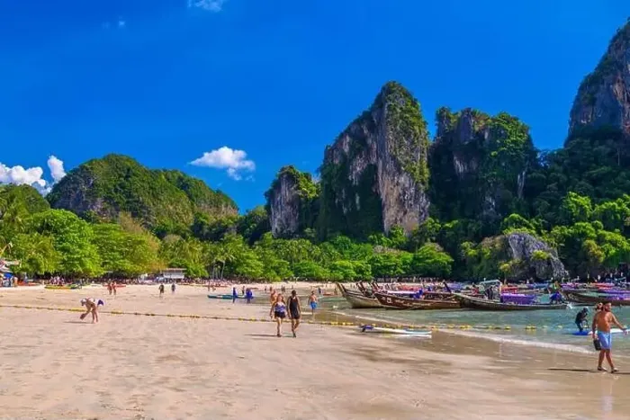 Framed Print : KRABI, THAILAND- MARCH 2018: Rocks, water and tropical white sand beach, Railay beach west, Ao Nang, Krabi, Thailand Framed Print : KRABI, THAILAND- MARCH 2018: Rocks, water and tropical white sand beach, Railay beach west, Ao Nang, Krabi, Thailand