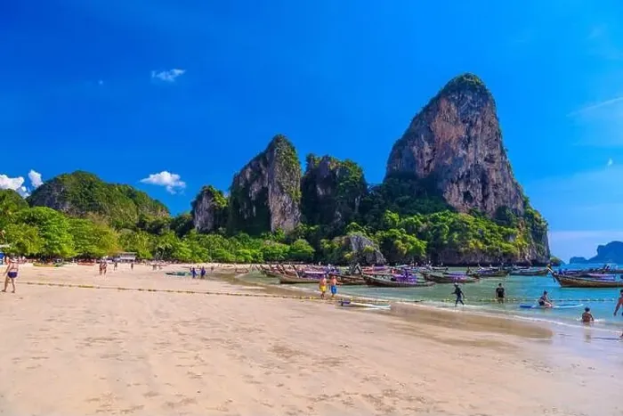 Framed Print : KRABI, THAILAND- MARCH 2018: Rocks, water and tropical white sand beach, Railay beach west, Ao Nang, Krabi, Thailand Framed Print : KRABI, THAILAND- MARCH 2018: Rocks, water and tropical white sand beach, Railay beach west, Ao Nang, Krabi, Thailand