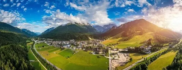 Framed Print : Kranjska Gora town in Slovenia at summer with beautiful nature and mountains in the background