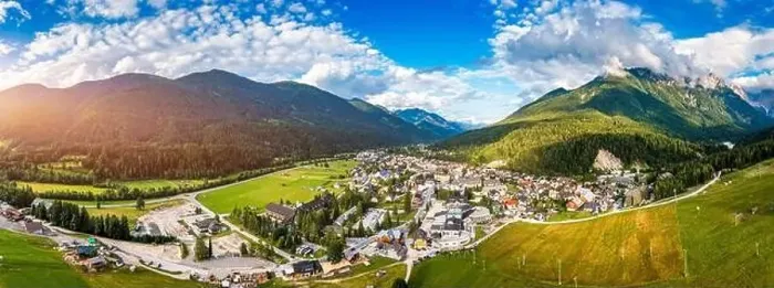 Framed Print : Kranjska Gora town in Slovenia at summer with beautiful nature and mountains in the background