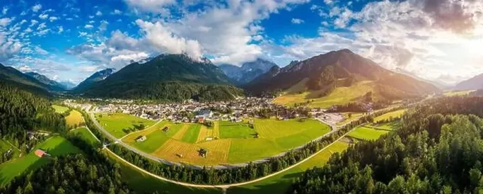 Framed Print : Kranjska Gora town in Slovenia at summer with beautiful nature and mountains in the background