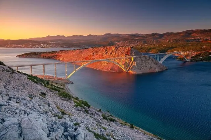 Framed Print : Krk Bridge, Croatia. Image of Krk Bridge which connects the Croatian island of Krk with the mainland at beautiful summer sunset