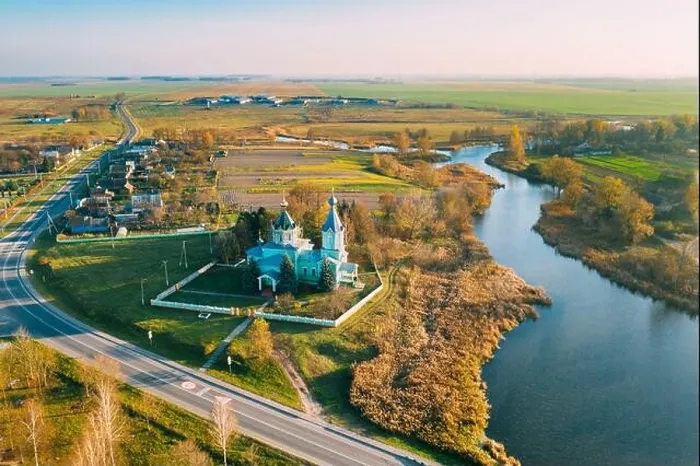 Framed Print : Krupets, Dobrush District, Gomel Region, Belarus. Aerial View Of Old Wooden Orthodox Church Of The Holy Trinity At Sunny Autumn Day
