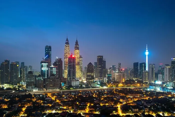 Framed Print : Kuala lumpur cityscape. Panoramic view of Kuala Lumpur city skyline during sunrise viewing skyscrapers building and Petronas twin tower in Malaysia Framed Print : Kuala lumpur cityscape. Panoramic view of Kuala Lumpur city skyline during sunrise viewing skyscrapers building and Petronas twin tower in Malaysia