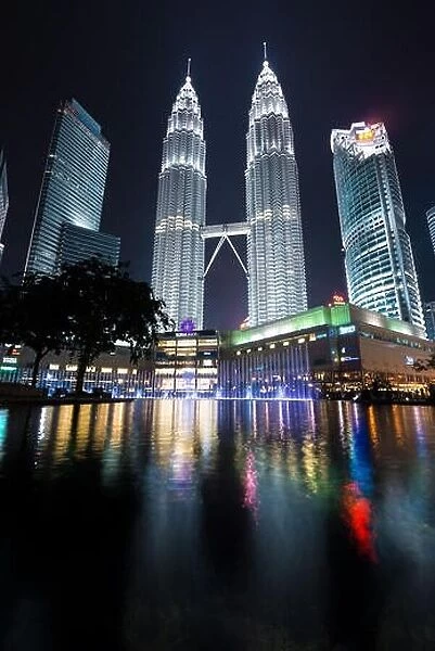 KUALA LUMPUR, MALAYSIA - April 16, 2016: Petronas Twin Towers with Musical fountain at night in Kuala Lumpur, Malaysia